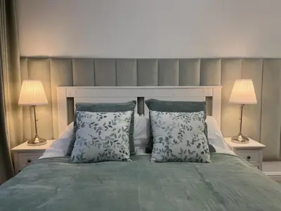 Łóżko lub łóżka w pokoju w obiekcie La Boutique Verte