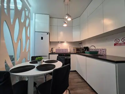 Kuchnia lub aneks kuchenny w obiekcie Apartament JK 47 A z miejscem postojowym w garażu
