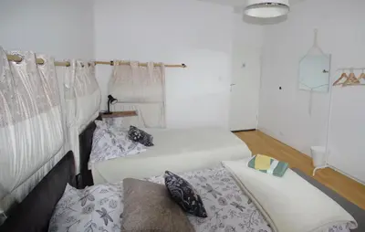 Łóżko lub łóżka w pokoju w obiekcie ToTuToTam_02
