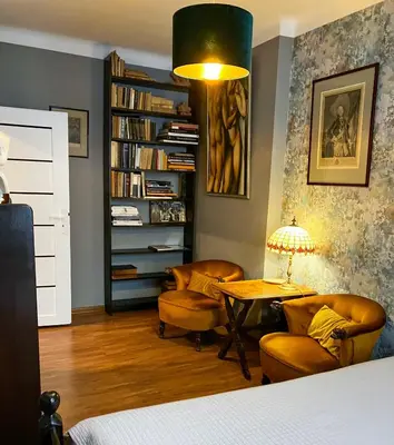 Łóżko lub łóżka w pokoju w obiekcie Art Apartament Chmielna 10