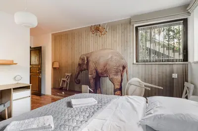 Łóżko lub łóżka w pokoju w obiekcie P&O Apartments Juhasów - Wawer
