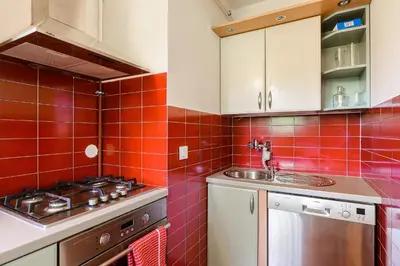 Kuchnia lub aneks kuchenny w obiekcie P&O Apartments Juhasów - Wawer