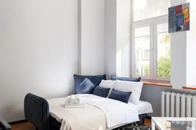 Część wypoczynkowa w obiekcie Hoża 62 Comfort Studio by BookingHost