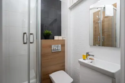 Łazienka w obiekcie Hoża 62 Comfort Studio by BookingHost