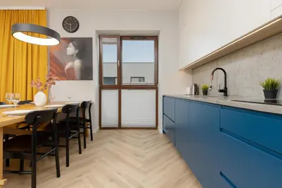 Kuchnia lub aneks kuchenny w obiekcie Cozy & Spacious Family Apartment by Noclegi Renters