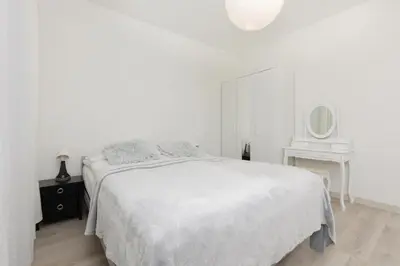 Łóżko lub łóżka w pokoju w obiekcie Kopcińskiego Bright & Spacious Apartment Warsaw Ursynów by Noclegi Renters