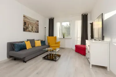 Część wypoczynkowa w obiekcie Kopcińskiego Bright & Spacious Apartment Warsaw Ursynów by Noclegi Renters
