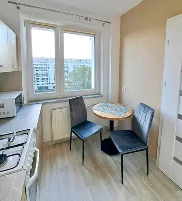 Kuchnia lub aneks kuchenny w obiekcie Ursynów Fine Apartment