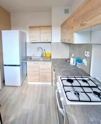 Kuchnia lub aneks kuchenny w obiekcie Ursynów Fine Apartment