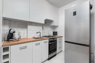 Kuchnia lub aneks kuchenny w obiekcie Górnośląska 17/19 by Homeprime