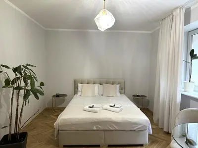 Łóżko lub łóżka w pokoju w obiekcie Art Deco Apartment