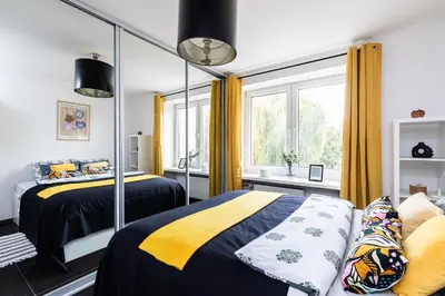Łóżko lub łóżka w pokoju w obiekcie SuperApart Puławska 119 - Blisko metra Wierzbno i parku