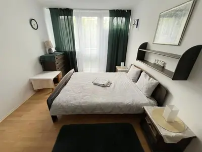 Łóżko lub łóżka w pokoju w obiekcie 416 Warsaw Center TAMARS