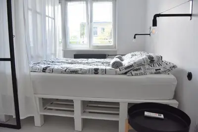 Łóżko lub łóżka w pokoju w obiekcie Apartment Warsaw Center Mokotowska