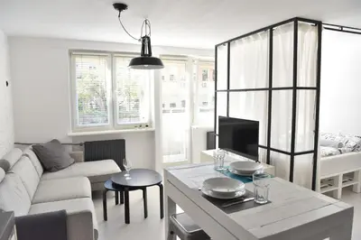 Telewizja i/lub zestaw kina domowego w obiekcie Apartment Warsaw Center Mokotowska