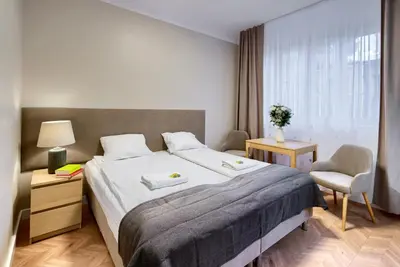 Łóżko lub łóżka w pokoju w obiekcie New! Modern Studio in Mokotów - near City Centre SGH Metro Tram by APARTEL