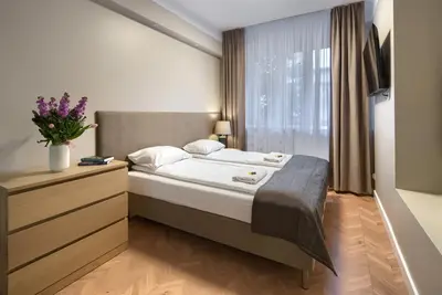 Łóżko lub łóżka w pokoju w obiekcie New! Modern Studio in Mokotów - near City Centre SGH Metro Tram by APARTEL