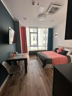Łóżko lub łóżka w pokoju w obiekcie Hotel Apart