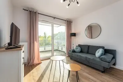 Telewizja i/lub zestaw kina domowego w obiekcie Nowy Służewiec 21 by Homeprime