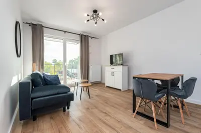 Część wypoczynkowa w obiekcie Nowy Służewiec 21 by Homeprime