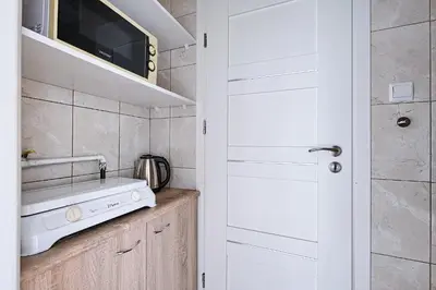 Kuchnia lub aneks kuchenny w obiekcie Urbannestgroup - Nowogrodzka 8