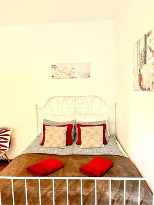 Łóżko lub łóżka w pokoju w obiekcie Best 1 Room Condo in Warszawa Center