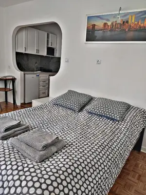 Łóżko lub łóżka w pokoju w obiekcie Ator Apartament