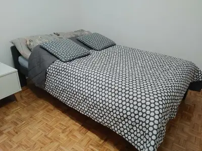 Łóżko lub łóżka w pokoju w obiekcie Ator Apartament