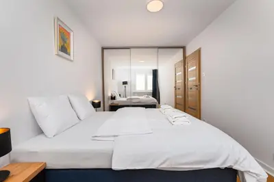 Łóżko lub łóżka w pokoju w obiekcie Apartament Jasna by Your Freedom