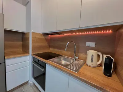 Kuchnia lub aneks kuchenny w obiekcie Studio Apartment Honey by Galeria Północna