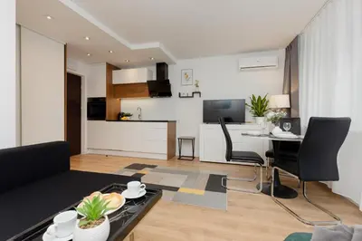 Część wypoczynkowa w obiekcie Studio Bruna Metro Pole Mokotowskie by Noclegi Renters