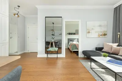 Część wypoczynkowa w obiekcie Cozy Apartment Gieysztora Wilanów by Noclegi Renters