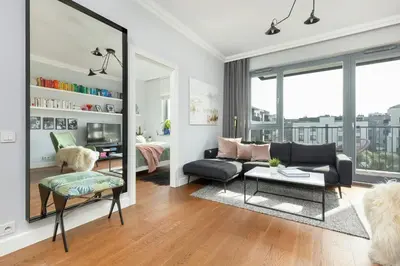 Część wypoczynkowa w obiekcie Cozy Apartment Gieysztora Wilanów by Noclegi Renters