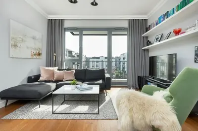 Część wypoczynkowa w obiekcie Cozy Apartment Gieysztora Wilanów by Noclegi Renters