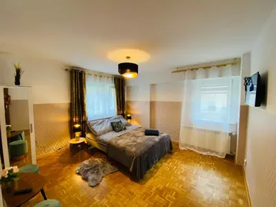 Łóżko lub łóżka w pokoju w obiekcie ClickTheFlat Solidarności City Center Apart Rooms