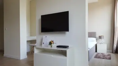 Telewizja i/lub zestaw kina domowego w obiekcie Chopin Apartments - City