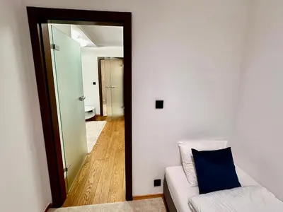 Łóżko lub łóżka w pokoju w obiekcie FORUM 3 metro fast WiFi 400 Mbs TV HBO Disney+