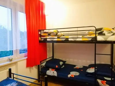 Łóżko lub łóżka w pokoju w obiekcie Ewa Dom