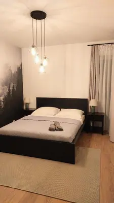Łóżko lub łóżka w pokoju w obiekcie Metro Targówek Mieszkaniowy - Amsterdam