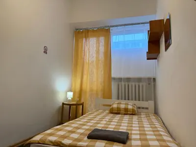 Łóżko lub łóżka w pokoju w obiekcie IVORY HOUSE ( CENTRUM )