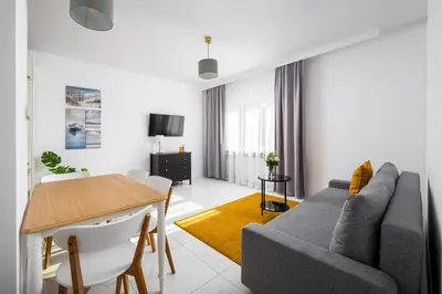 Telewizja i/lub zestaw kina domowego w obiekcie Park Skaryszewski Cosy Apartment by BookingHost