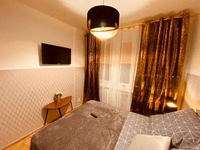 Łóżko lub łóżka w pokoju w obiekcie ClickTheFlat Wokalna Apart Rooms