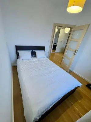 Łóżko lub łóżka w pokoju w obiekcie Concept Mokotów Prime Apartment