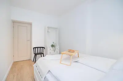 Łóżko lub łóżka w pokoju w obiekcie ShortStayPoland Dąbrowszczaków (B138)