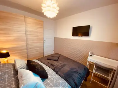 Łóżko lub łóżka w pokoju w obiekcie ClickTheFlat Miła Center Apart Rooms