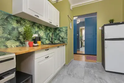 Kuchnia lub aneks kuchenny w obiekcie Turquoise Blue Apartment Warsaw Białołęka by Noclegi Renters