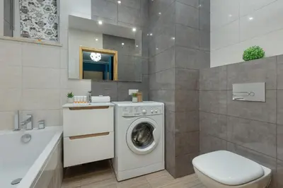 Łazienka w obiekcie Turquoise Blue Apartment Warsaw Białołęka by Noclegi Renters