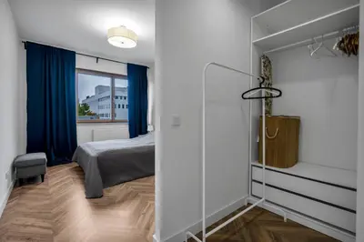 Łóżko lub łóżka w pokoju w obiekcie Business District Apartment - Parking, Balcony by Rentujemy