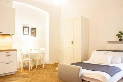 Łóżko lub łóżka w pokoju w obiekcie Mieszkanie w sercu Warszawy