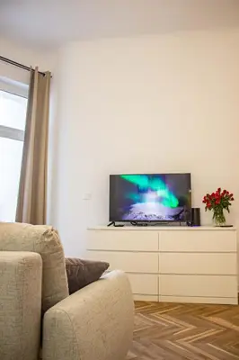 Telewizja i/lub zestaw kina domowego w obiekcie Mieszkanie w sercu Warszawy